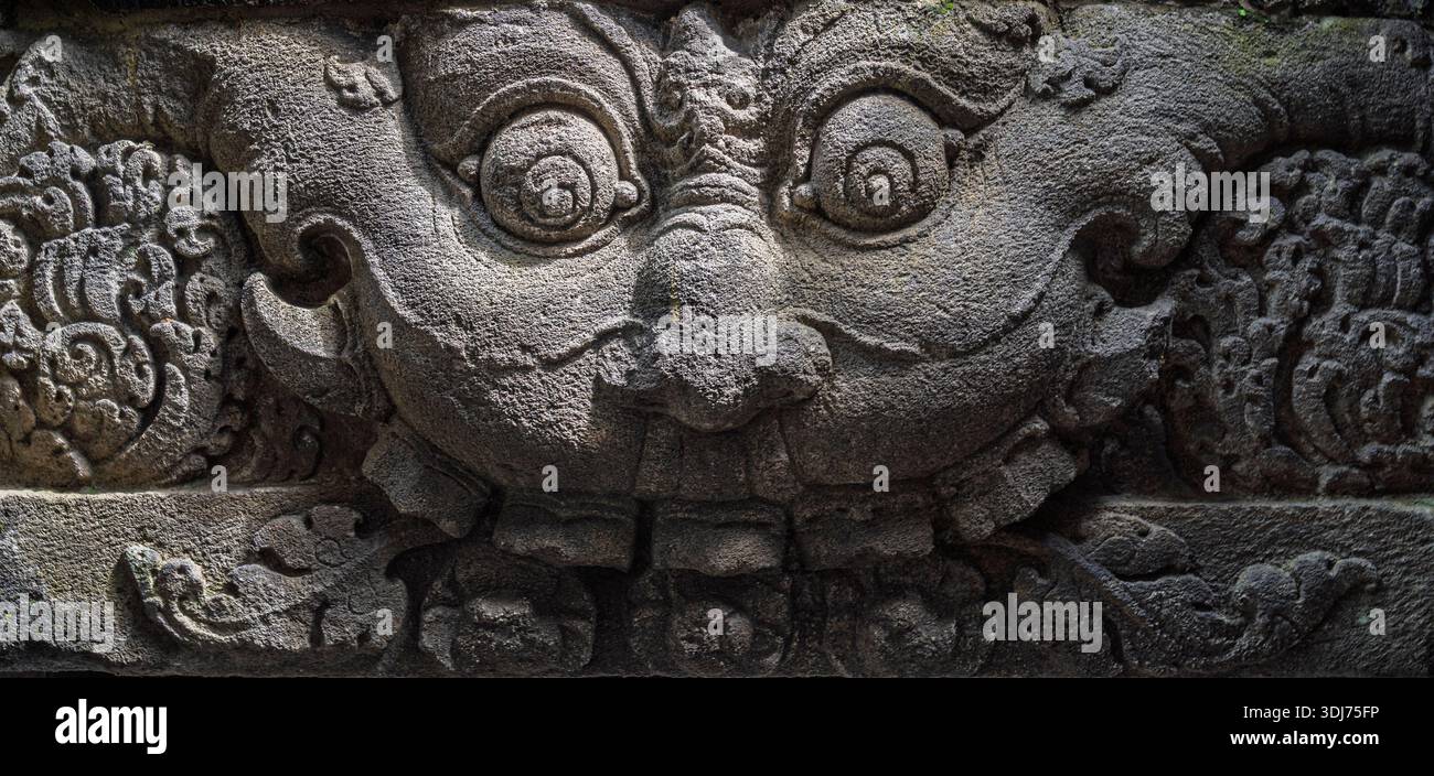 Closeup view of fierce Kala aka Kirtimukha protector face on stone ...