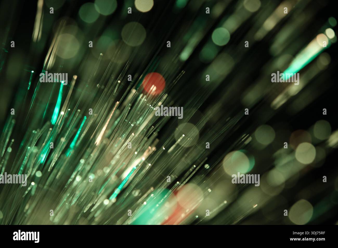 Fiber optical network cable close up with bokeh background Stock Photo