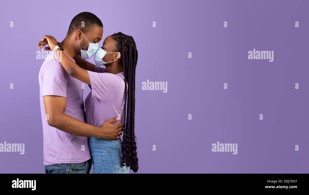 Black couple kissing face masks hi-res stock photography and images - Alamy