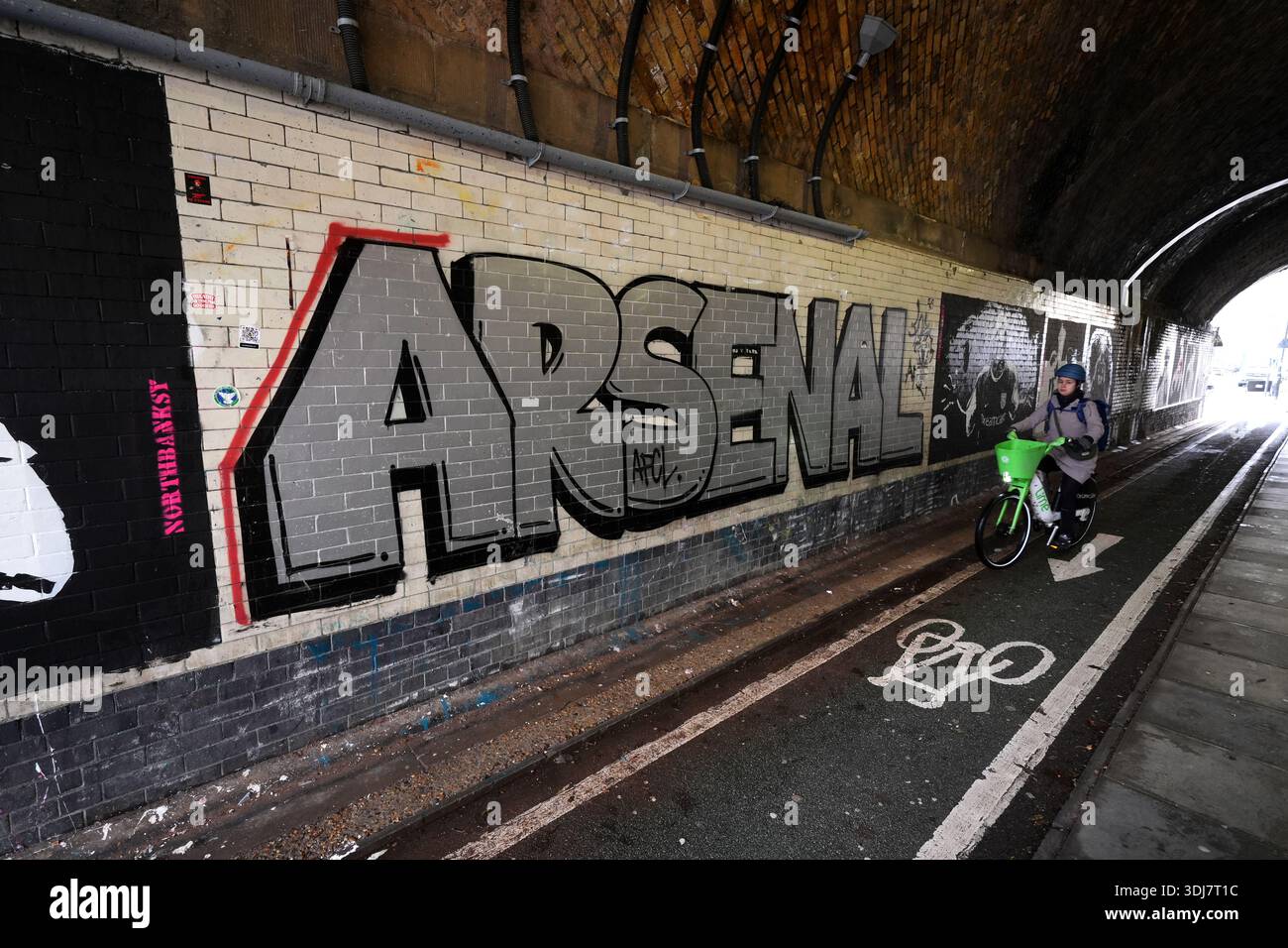 Street art in The Arsenal x Northbanksy Tunnel near the ground