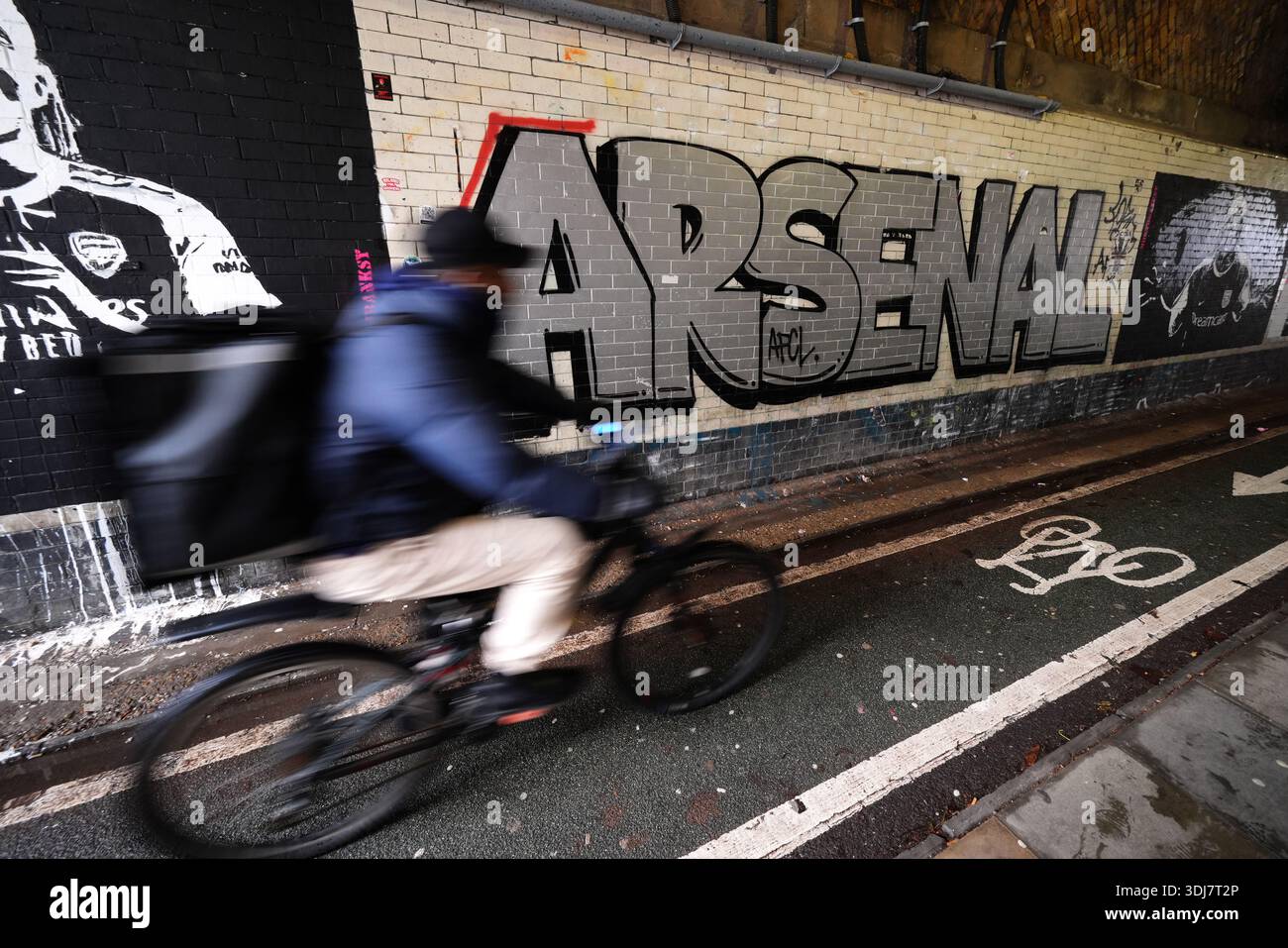 Street art in The Arsenal x Northbanksy Tunnel near the ground
