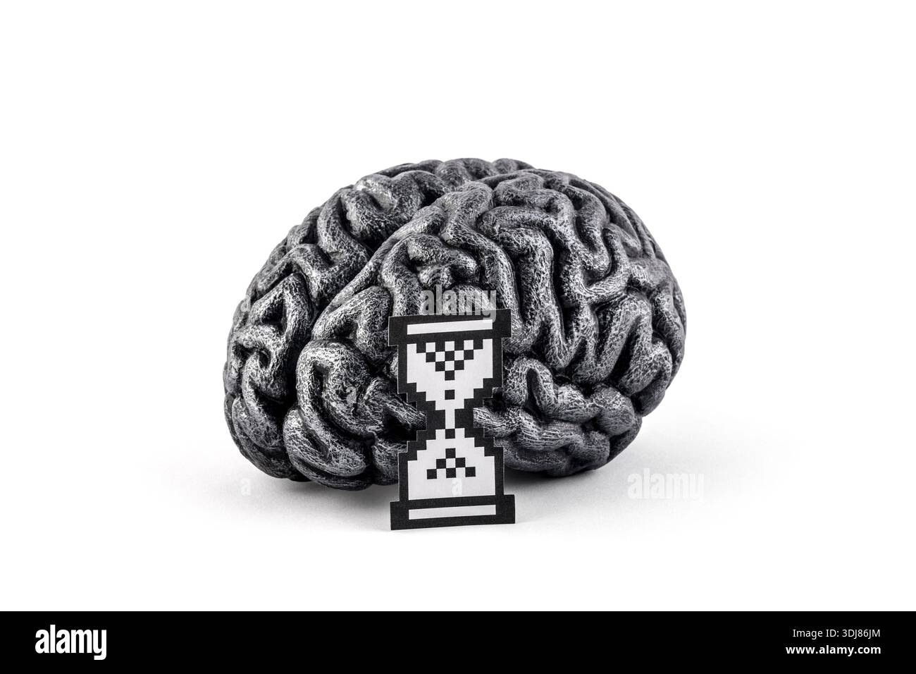 Human silver brain model with paper pixel hourglass computer symbol represents that the system is busy, processing data. Stock Photo