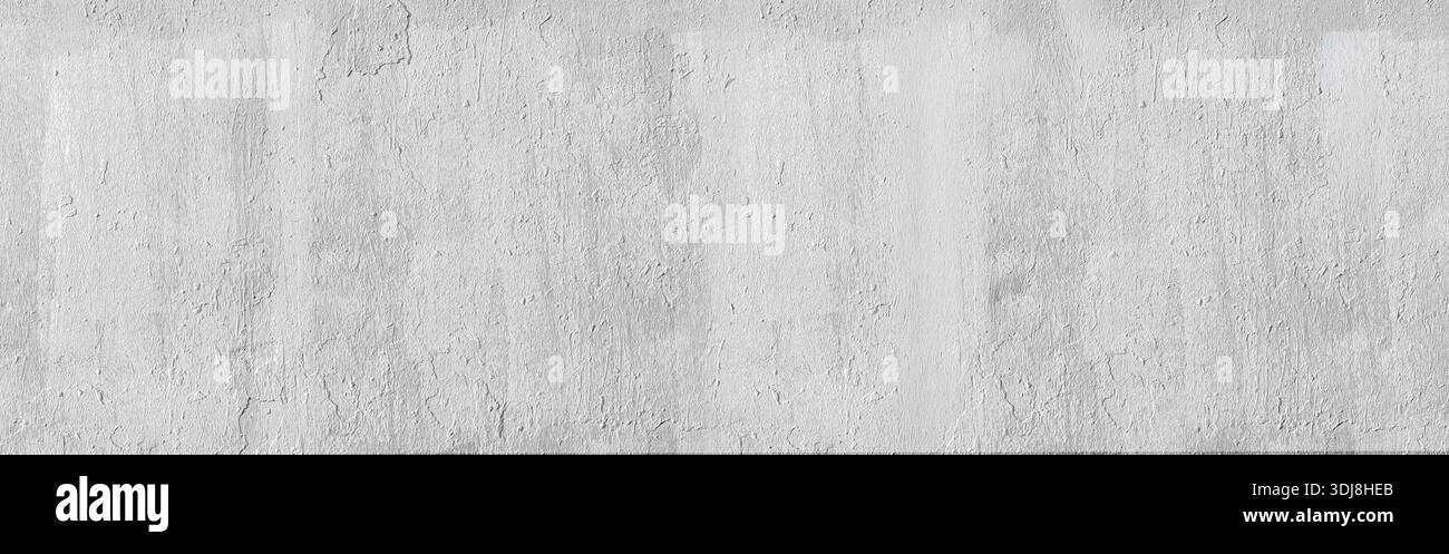Rough white painted concrete wall showcasing detailed texture and abstract pattern Stock Photo