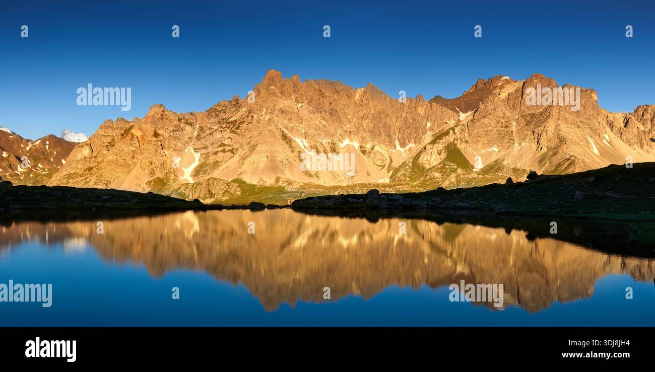 Mountain lake reflection peaks hi-res stock photography and images - Alamy
