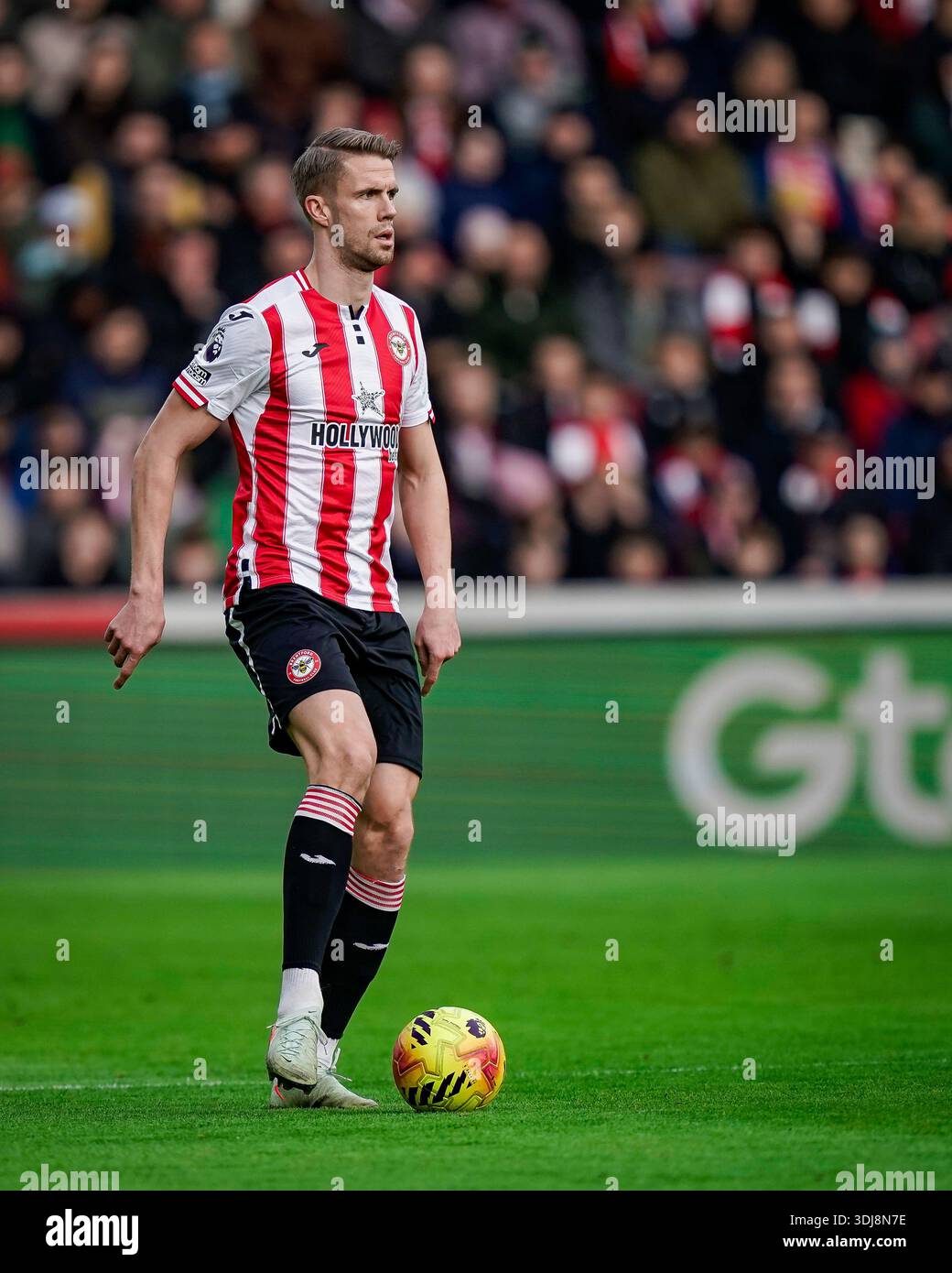 kristoffer-ajer-of-brentford-controls-the-ball-during-the-premier