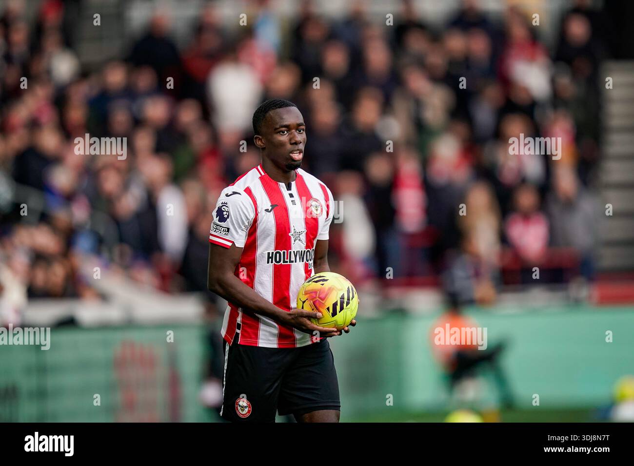Michael Kayode Of Brentford Prepares To Takeca Throw in During The michael-kayode-of-brentford-prepares-to-takeca-throw-in-during-the