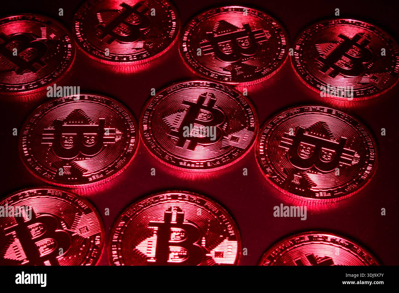 March 28, 2020, Veranne, Loire, France: Bitcoin cryptocurrency coin seen  displayed on a laptop keyboard with red ambient lighting. (Credit Image: ©  Romain Doucelin/SOPA Images via ZUMA Press Wire) EDITORIAL USAGE ONLY!