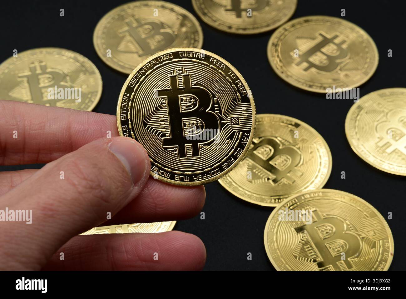 March 28, 2020, Veranne, Loire, France: Bitcoin cryptocurrency coins seen  displayed on a laptop keyboard. (Credit Image: © Romain Doucelin/SOPA  Images via ZUMA Press Wire) EDITORIAL USAGE ONLY! Not for Commercial USAGE!