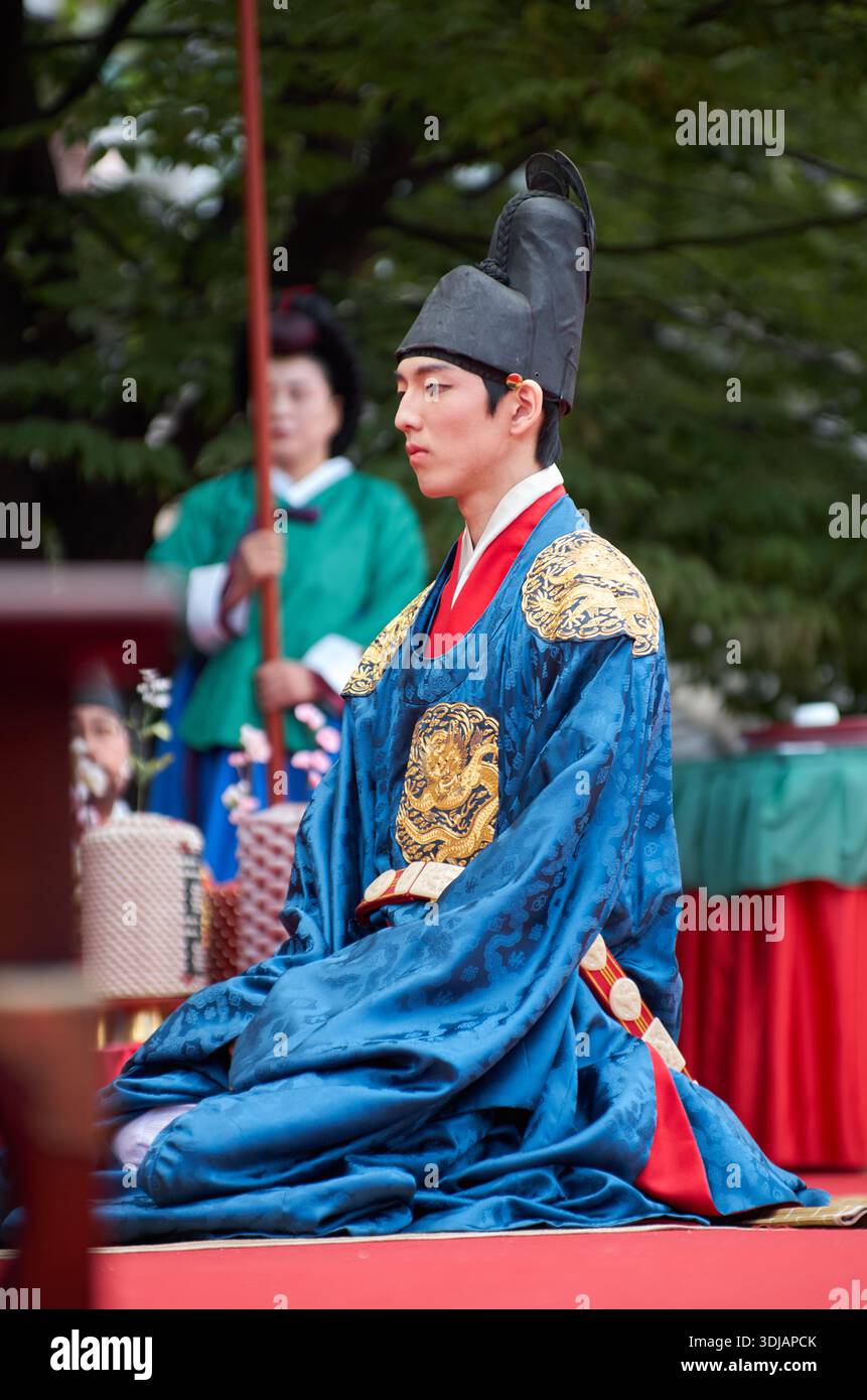 Seoul, South Korea: Performer dressed as Joseon dynasty king seated ...