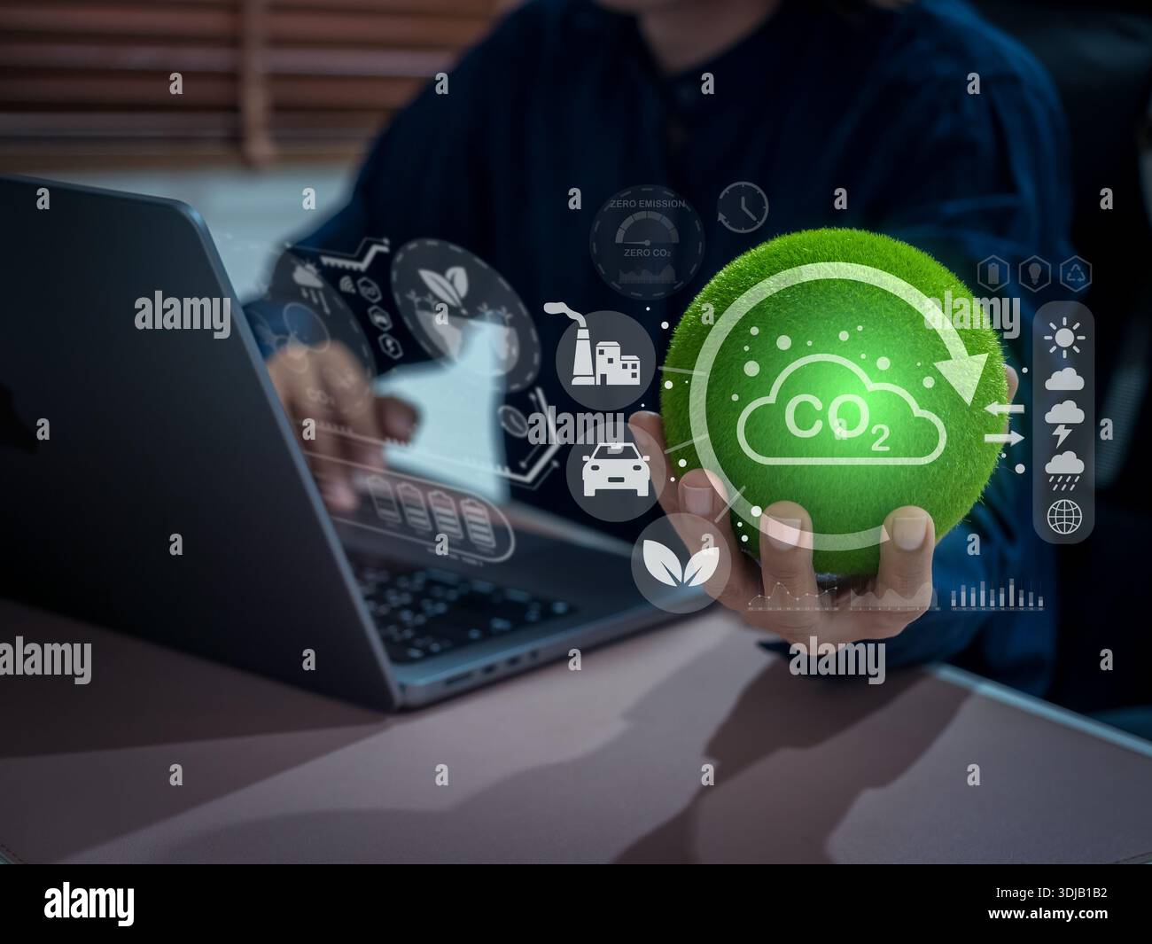 Hand holding green globe with CO2 reduction icon and digital dashboard ...