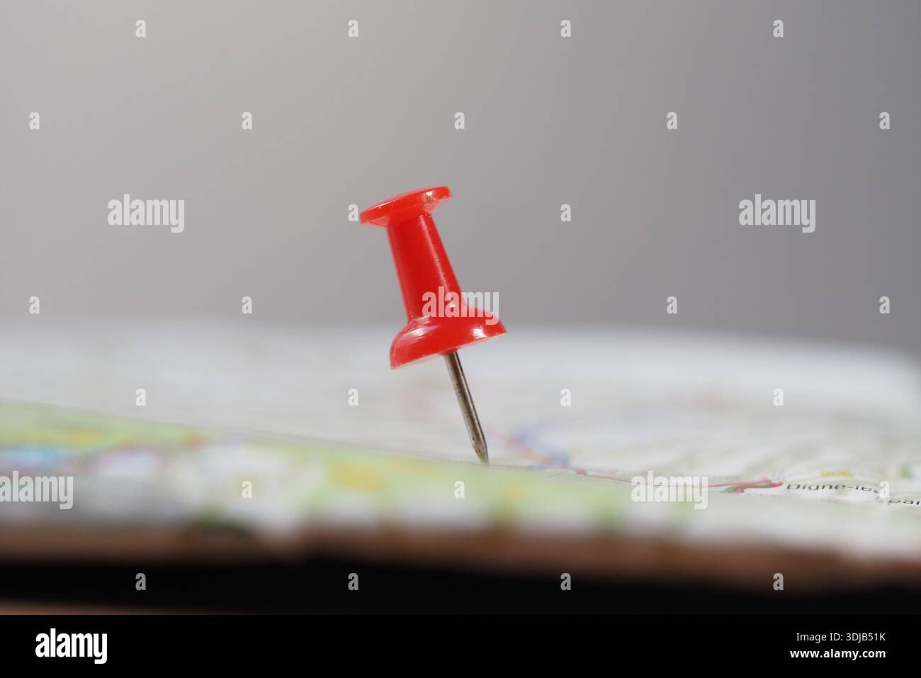 Pin marks location on a map in a simple setting Stock Photo