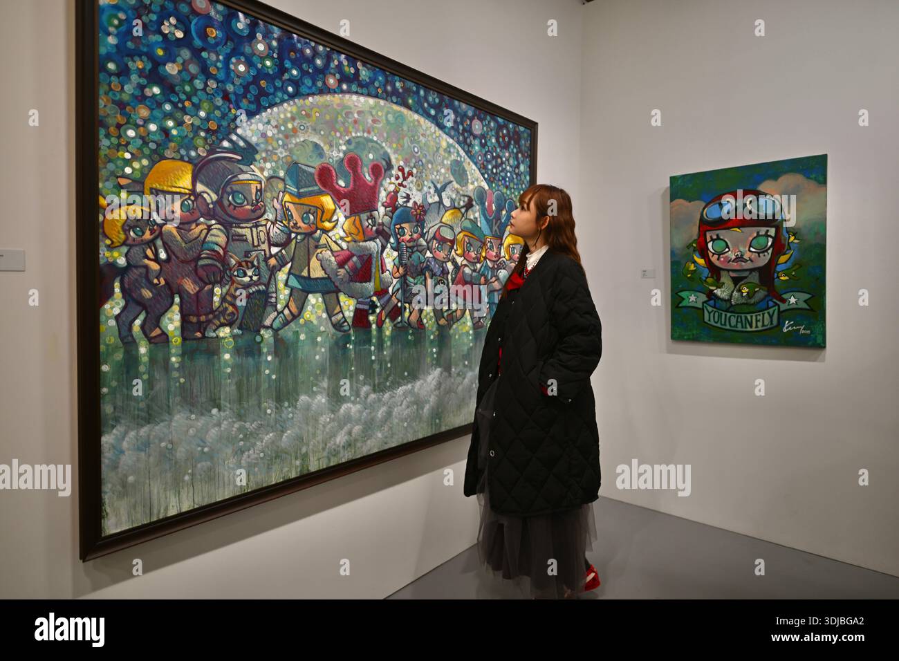 Unchanging Star A girl watches the artwork