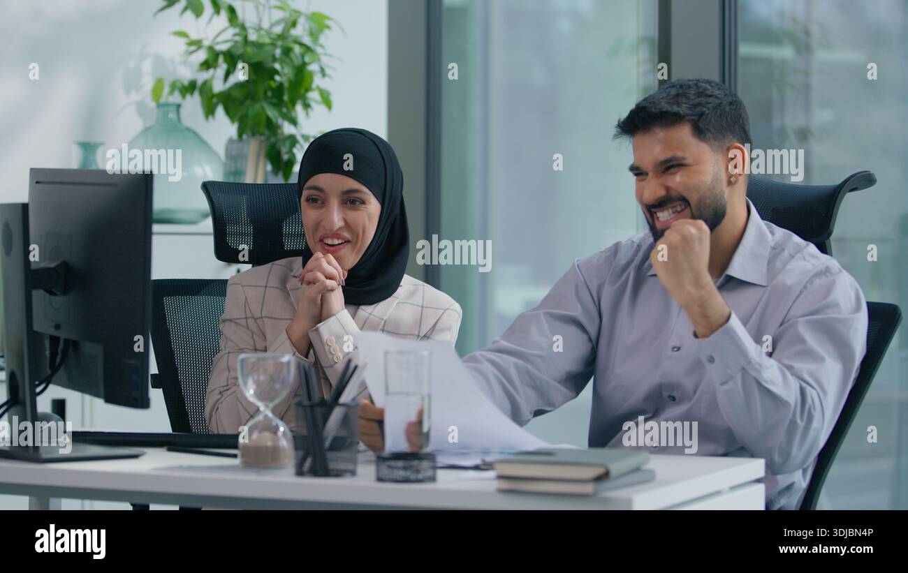Two muslim business team in office working Islamic group Indian co ...