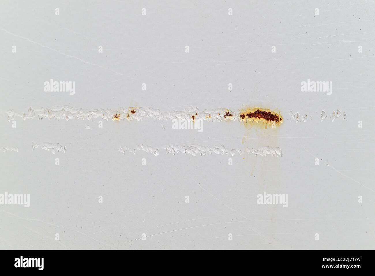 White-painted metal with rust Stock Photo