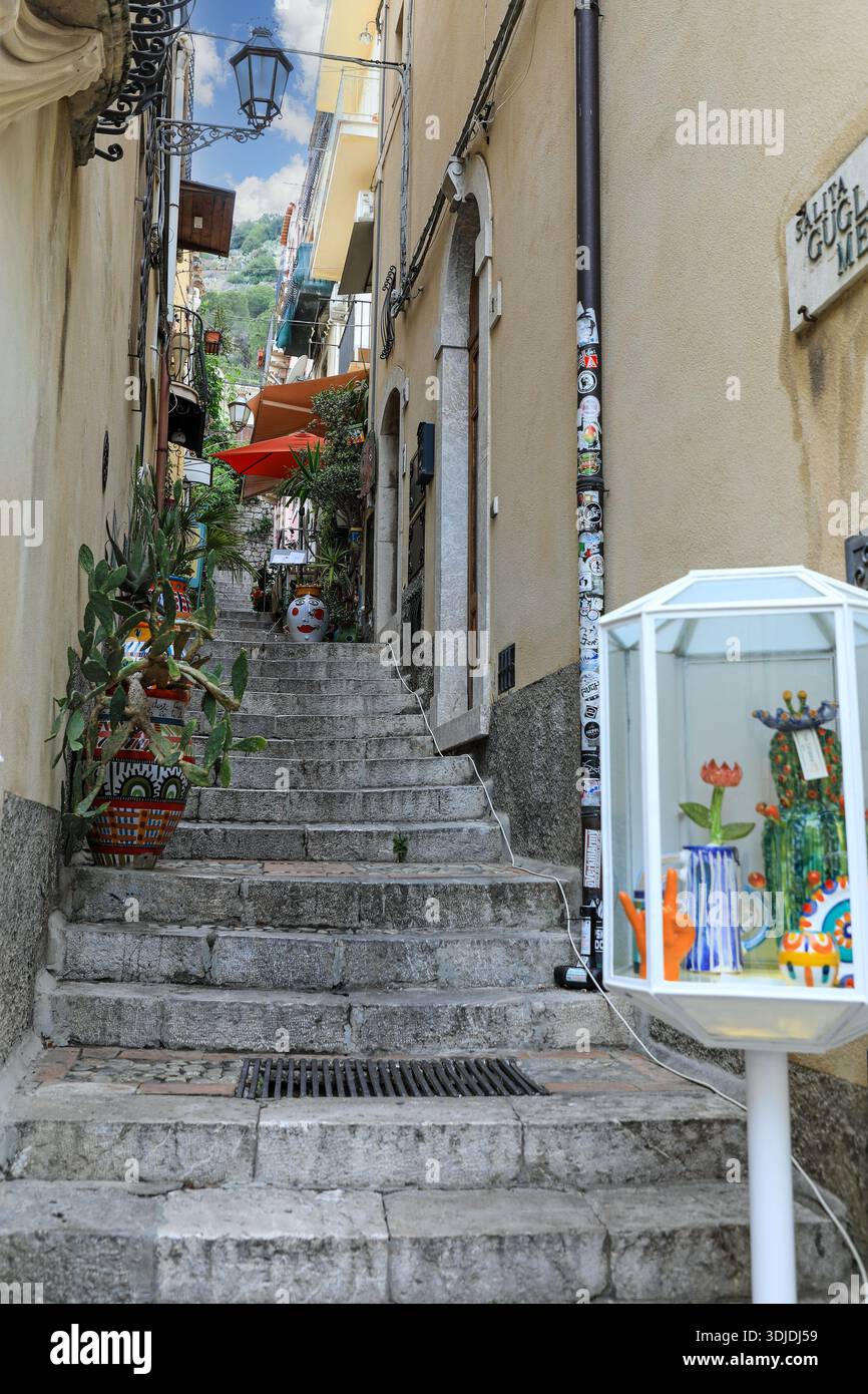 Salita Guglielmo melivia, a narrow street in Taormina, Sicily, Italy, Europe Stock Photo