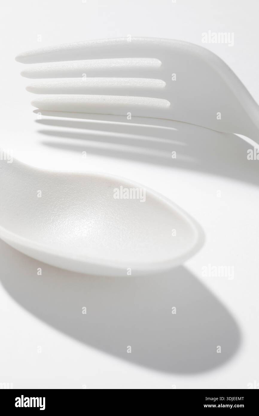 WA31003-00.....WASHINGTON - Polypropylene spoon and fork on white. Stock Photo