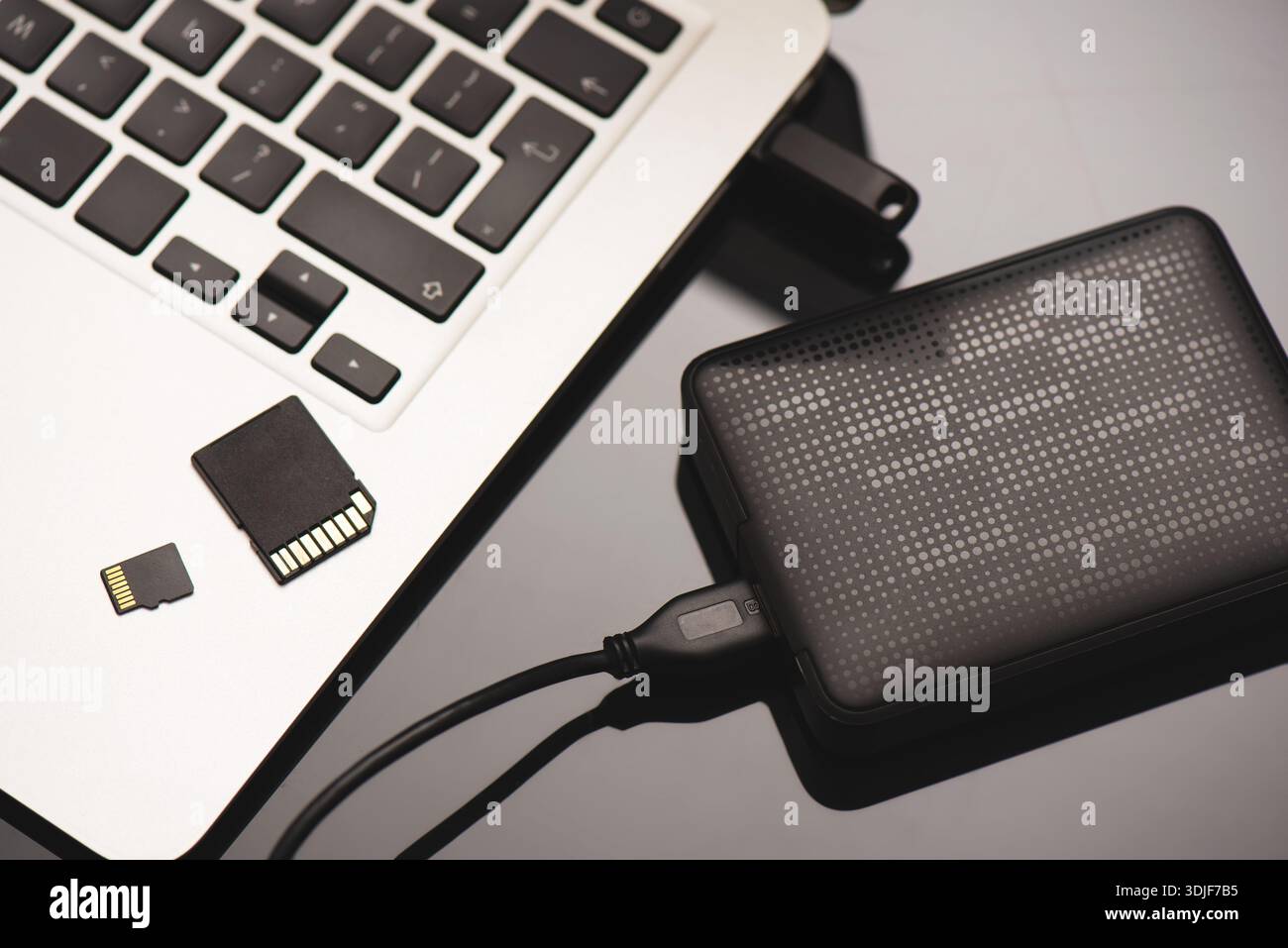 Multiple storage devices, pendrive, memory cards. Storage media concept Stock Photo