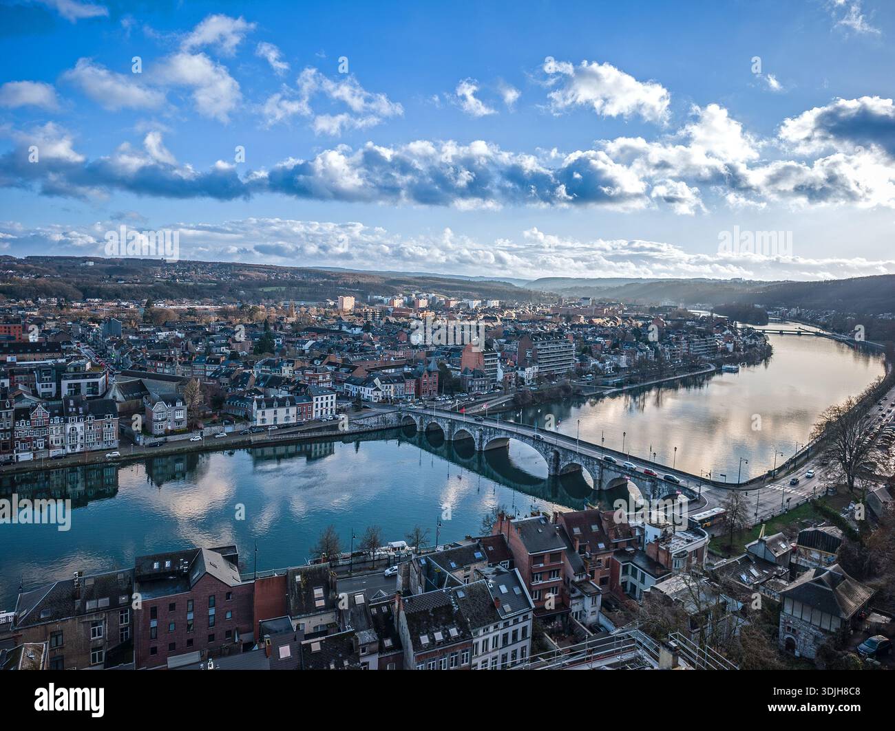 A sweeping panoramic view from the Citadel of Namur looking over the Meuse River, capturing the city’s historic skyline, natural landscape, and iconic Stock Photo
