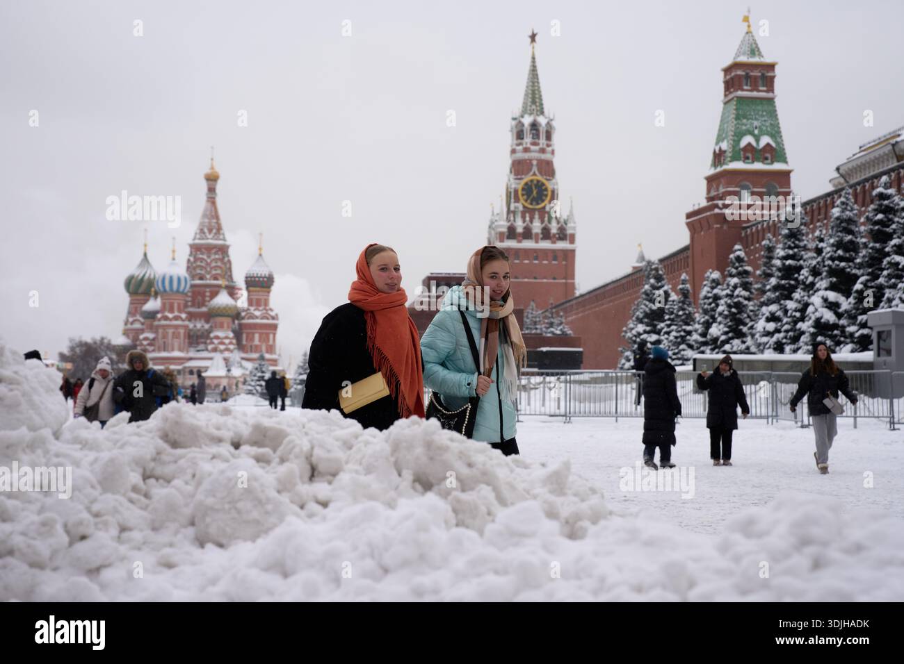 Moscow In January People walk in snow covered Red Square after a snowfall in Moscow ...