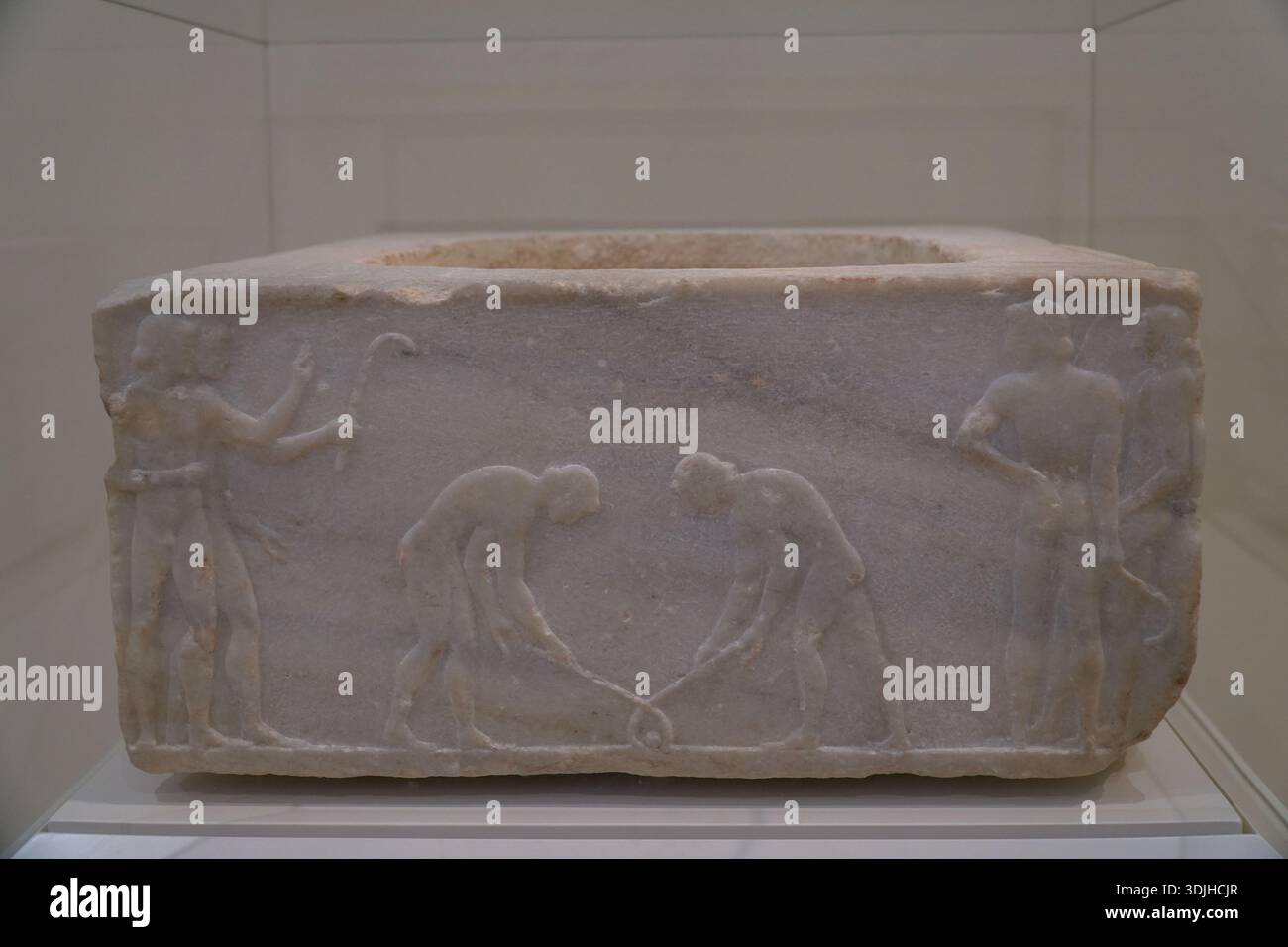 Funerary kouros base, Pentelic marble. Relief carving showing ancient ...