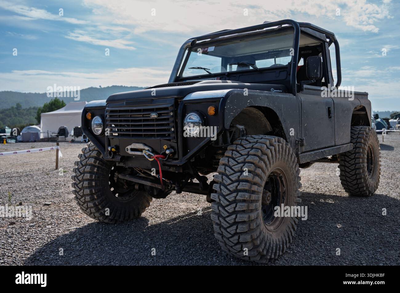 Aggressive, modified black Land Rover Defender pickup, short wheelbase ...