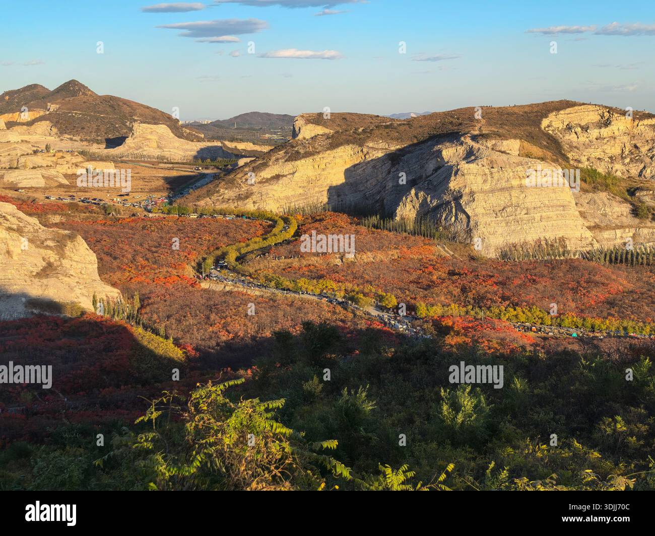 Rugged Cliffs and Autumn Colors in Jiangfu Mountain Stock Photo