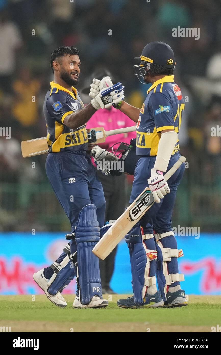 Sri Lanka's Pavan Rathnayake celebrates his century with Jeffrey ...