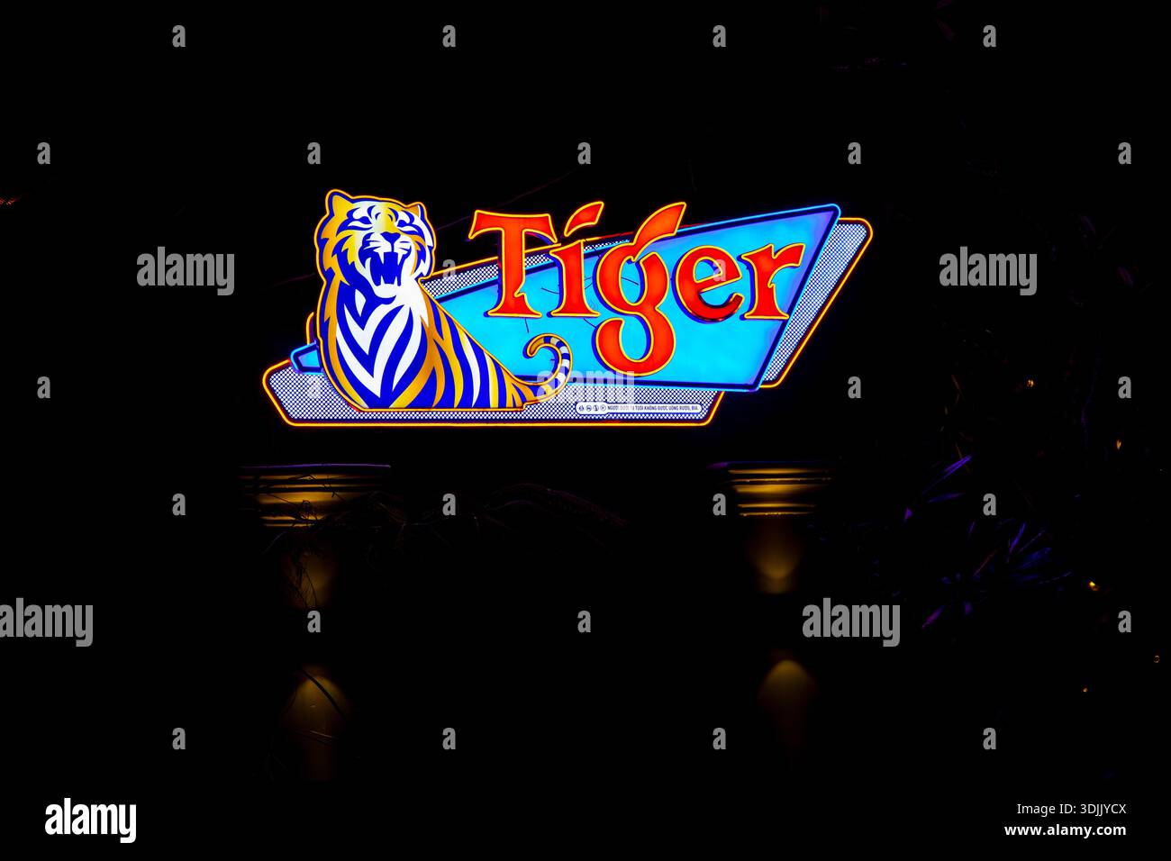 An illuminated Tiger Beer sign in Ho Chi Minh City, Vietnam Stock
