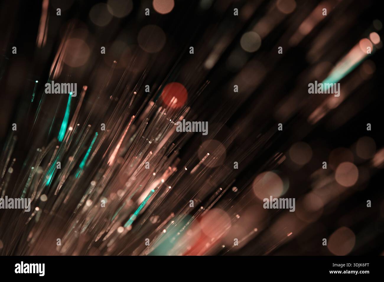Fiber optical network cable close up with bokeh background Stock Photo