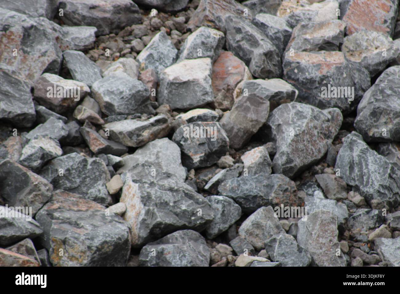 Angualr Rocks Angular rock fragments and gravel forming a rocky surface, showing ...