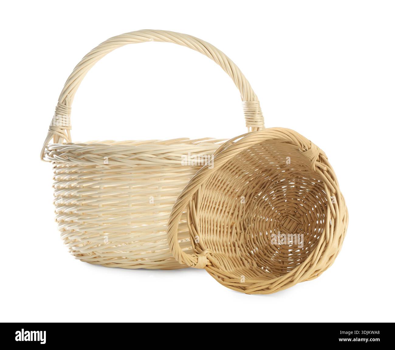 Two empty wicker baskets isolated on white Stock Photo