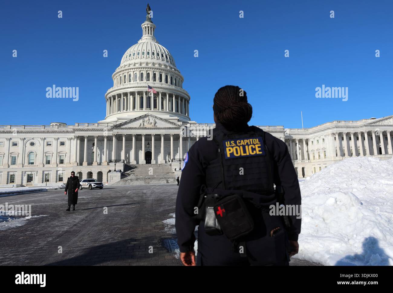 A U.S. Capitol Police officer patrols on the East Front of the U.S ...