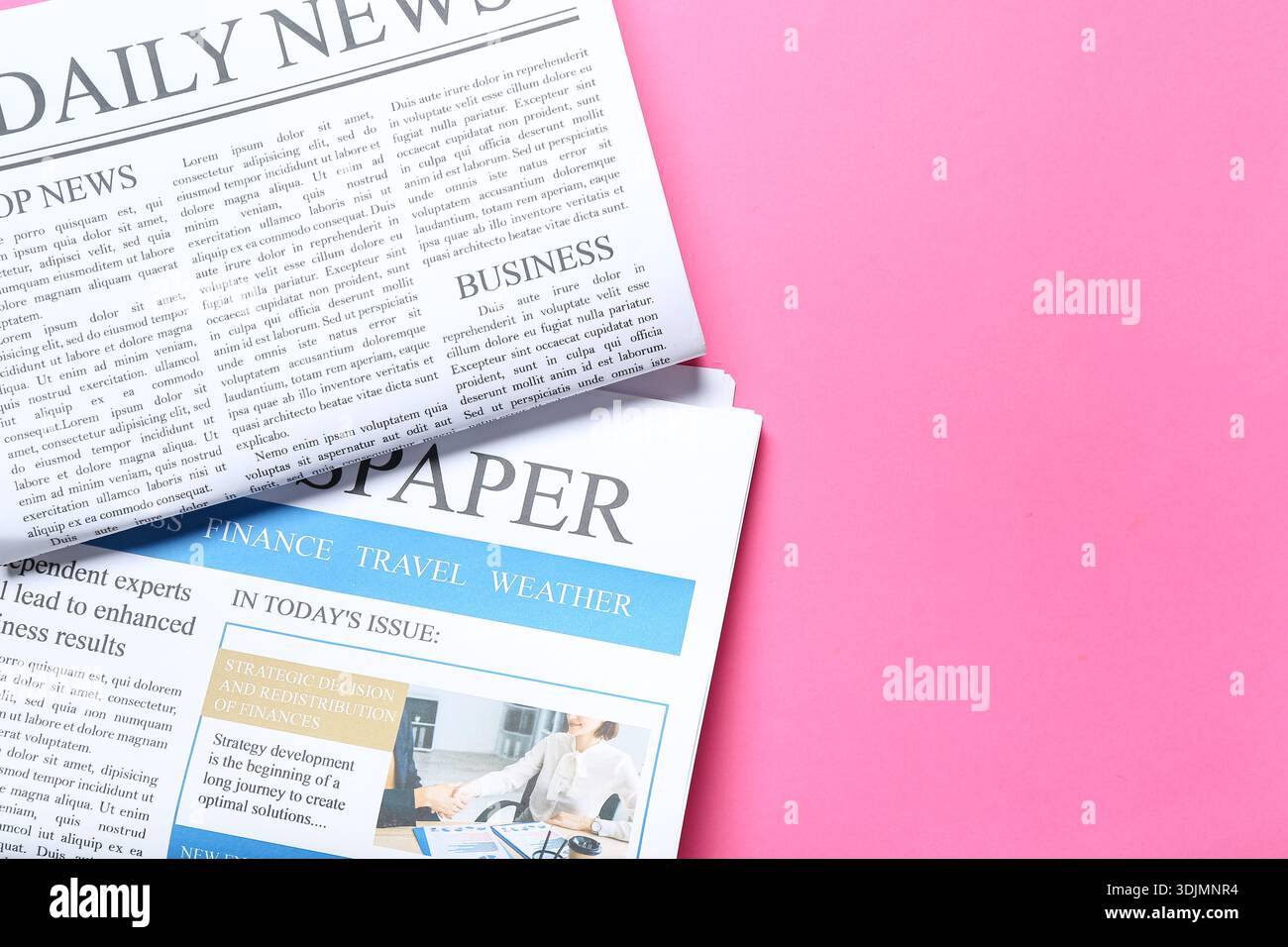Different newspapers on pink background Stock Photo