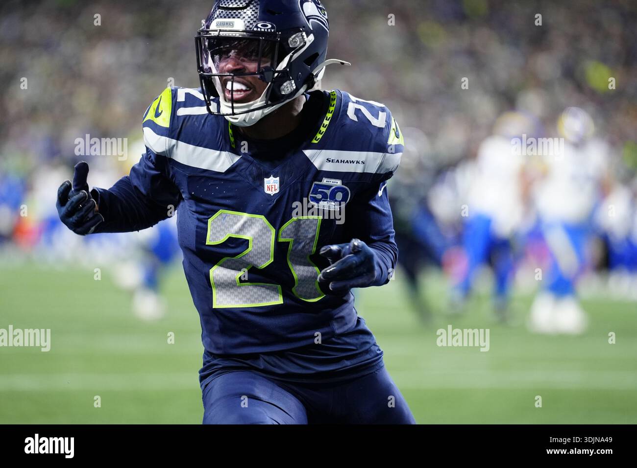 Seattle Seahawks cornerback Devon Witherspoon (21) runs down the field ...