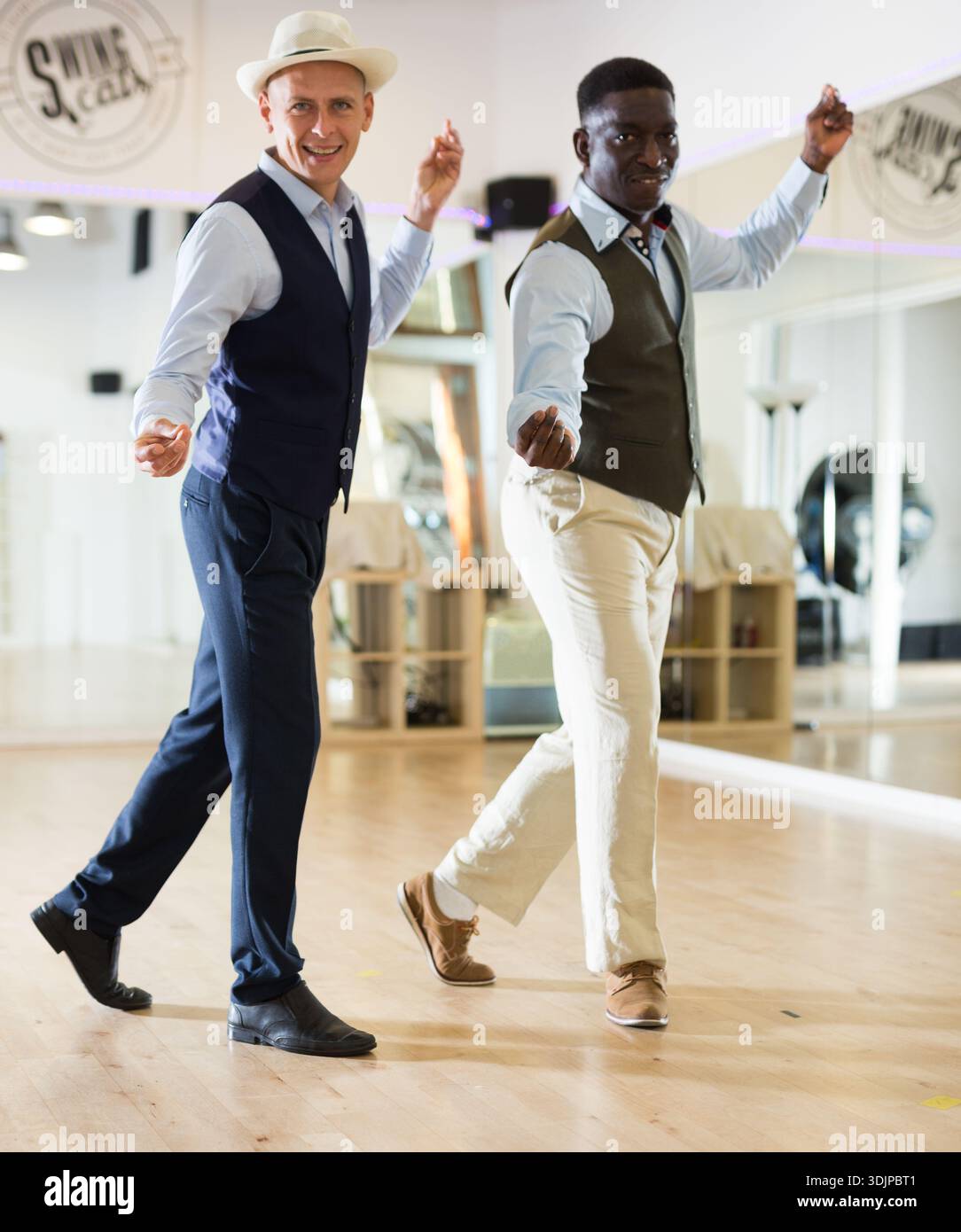 Two professional dancers practicing lindy hop in dance class Stock Photo