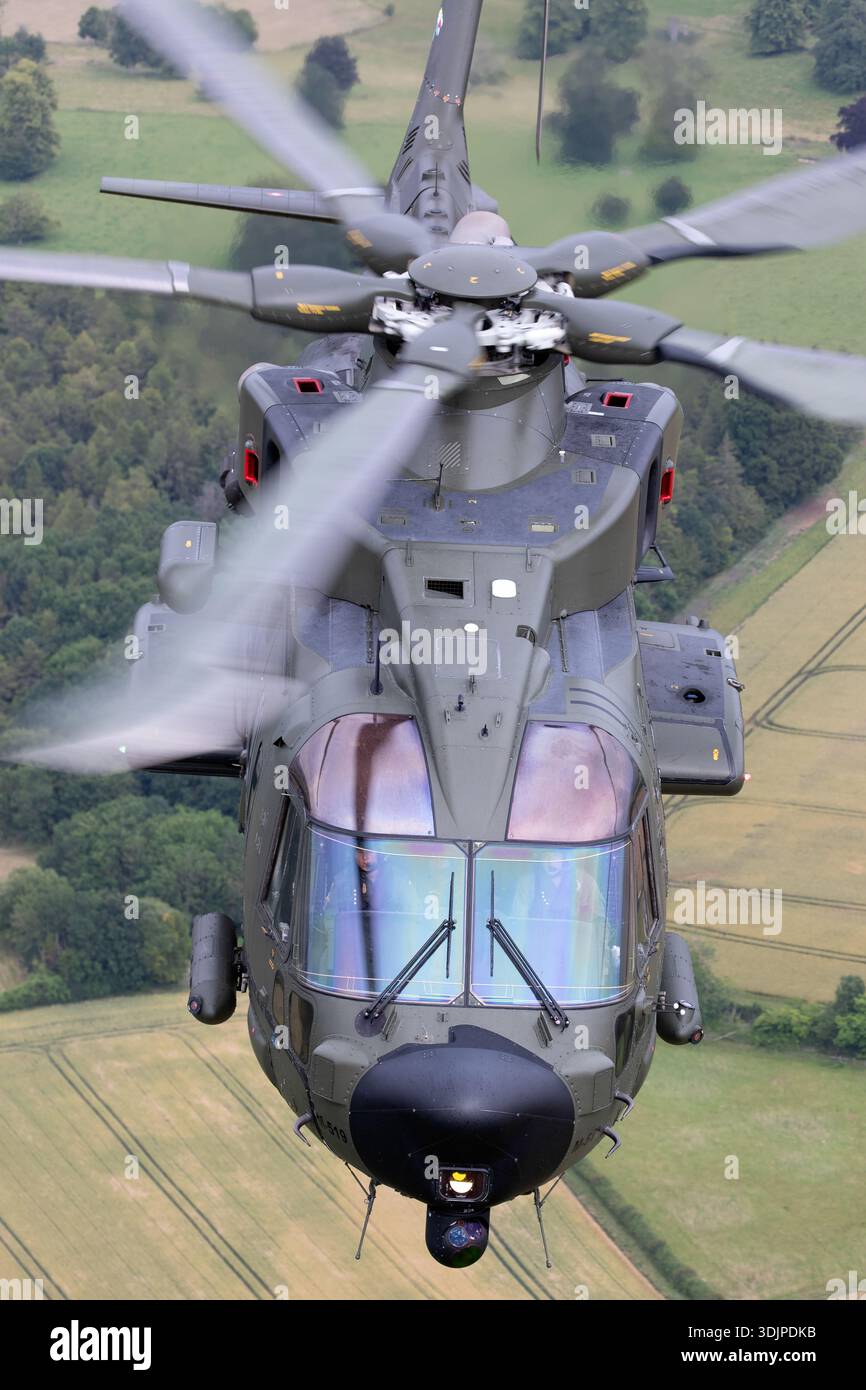 The image captures a Danish Air Force AW101 Merlin Joint Supporter ...
