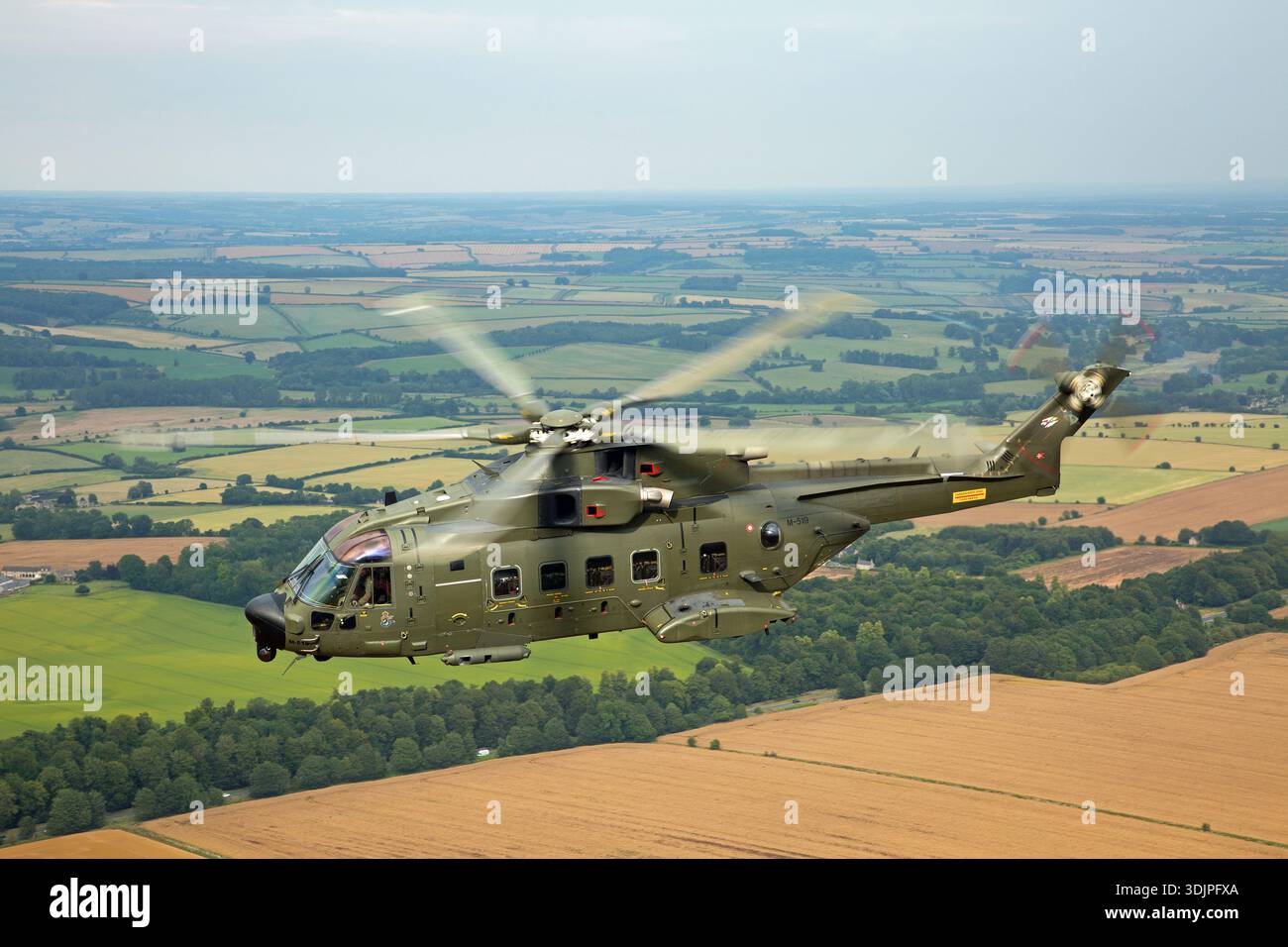 Air-to-air photograph of a Danish Air Force EH101-512 Merlin Joint ...