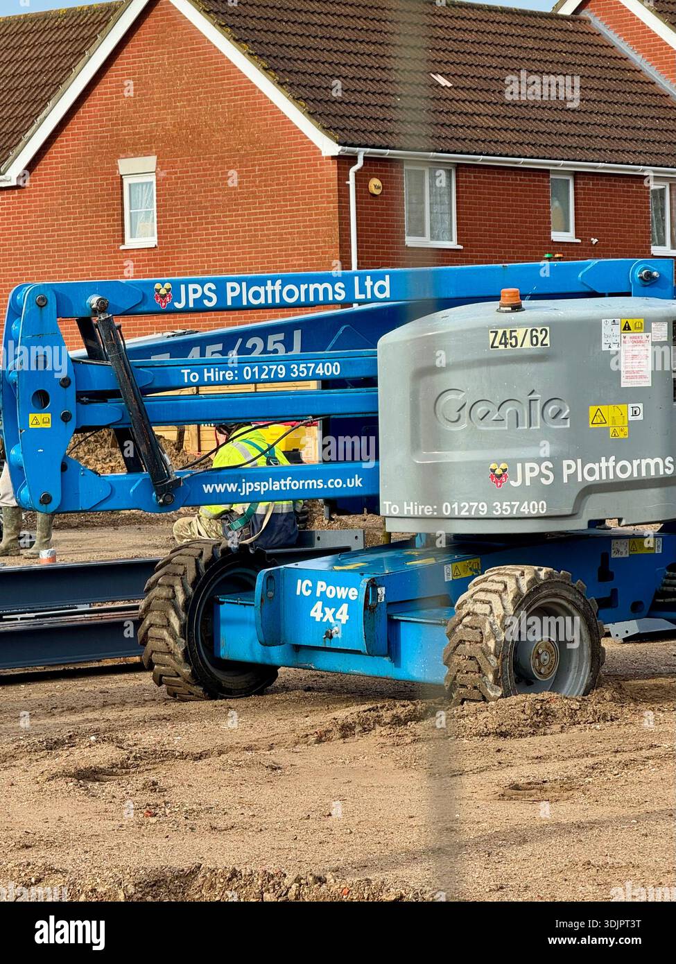 Kesgrave, Suffolk - 28 January 2026: Construction of a new Co Op supermarket in progess in the Grange Farm area. JPS hire ltd blue crane platform. - Smartphone Captured Stock Image