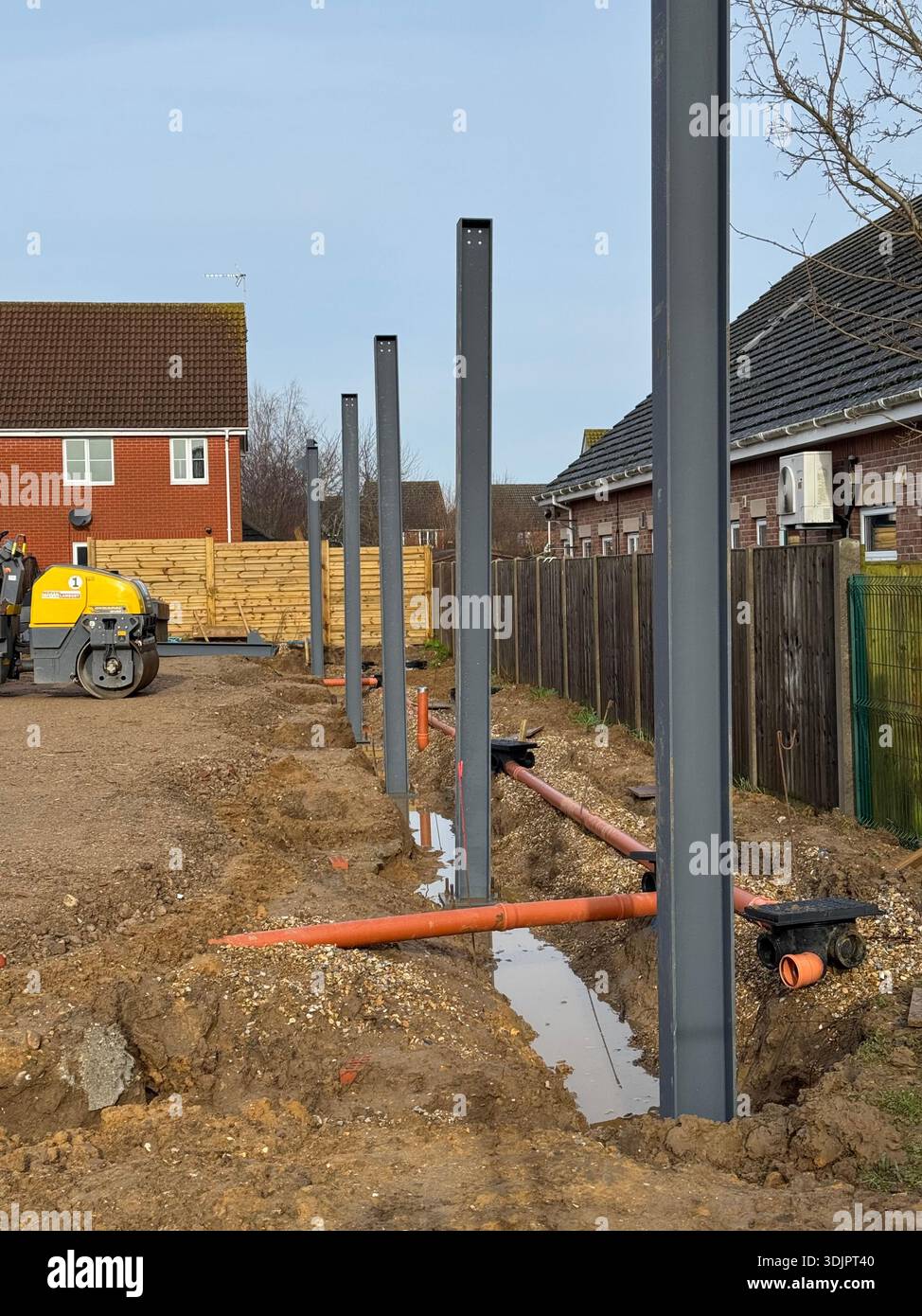 Kesgrave, Suffolk - 28 January 2026: Construction of a new Co Op supermarket in progess in the Grange Farm area. Vertical girders going up. - Smartphone Captured Stock Image