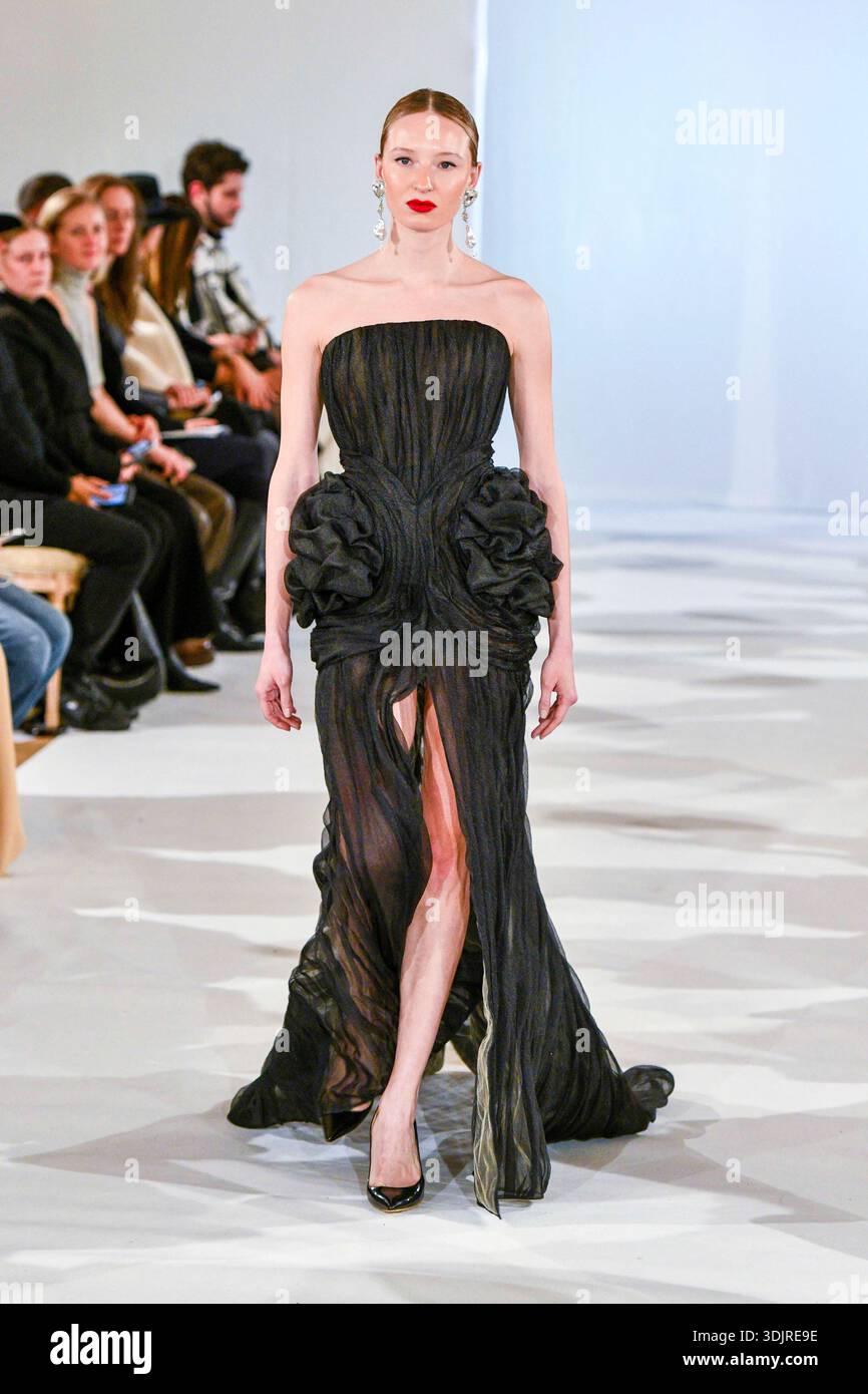 A model walks the runway during the Inclover Haute Couture Week Spring ...