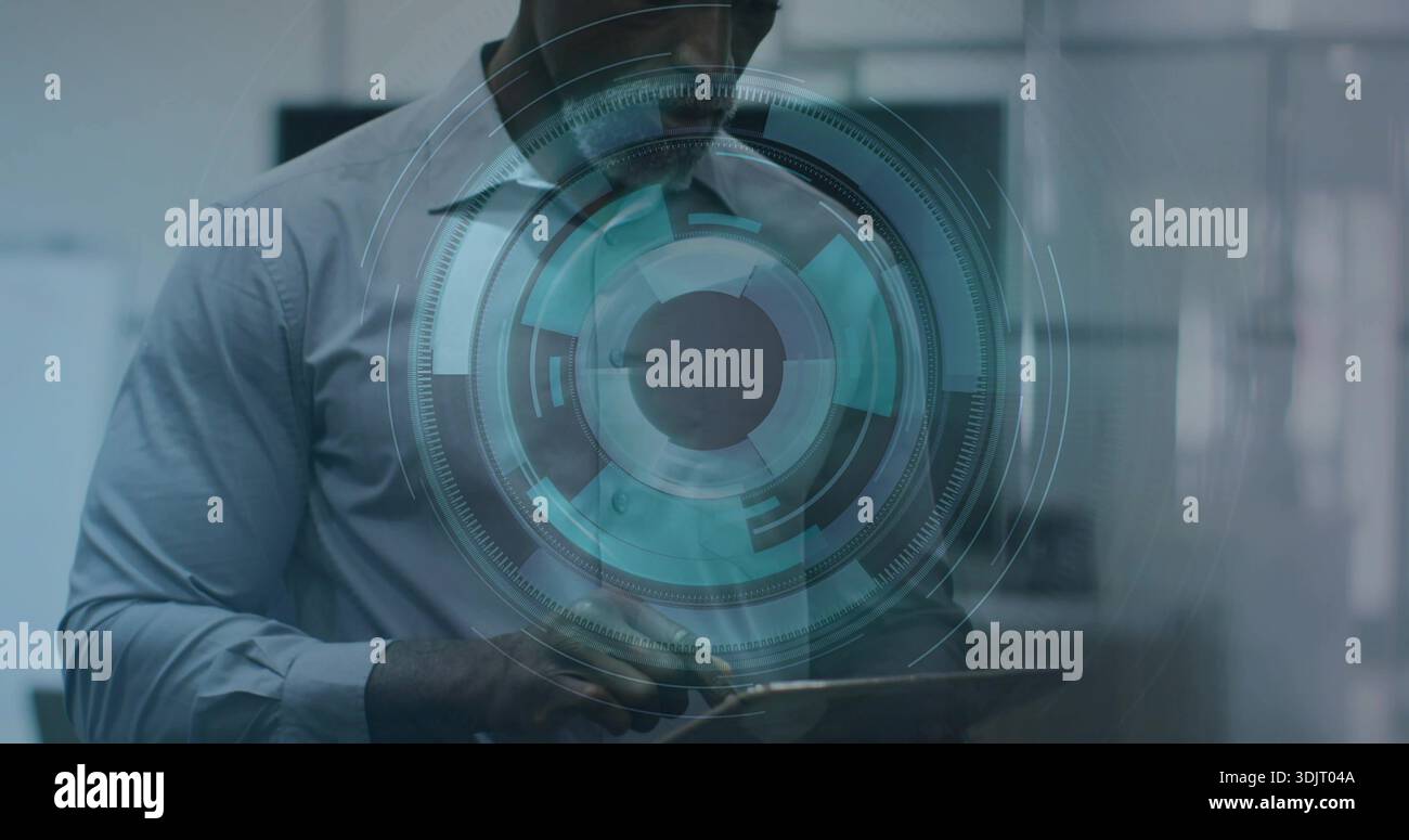 Working man wearing light shirt, glasses, using tablet behind glass with holographic UI in office Stock Photo