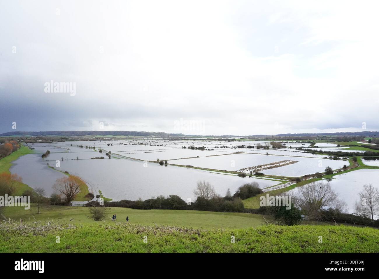 Floodwater in Burrowbridge, Somerset. Hundreds of flood warnings and ...