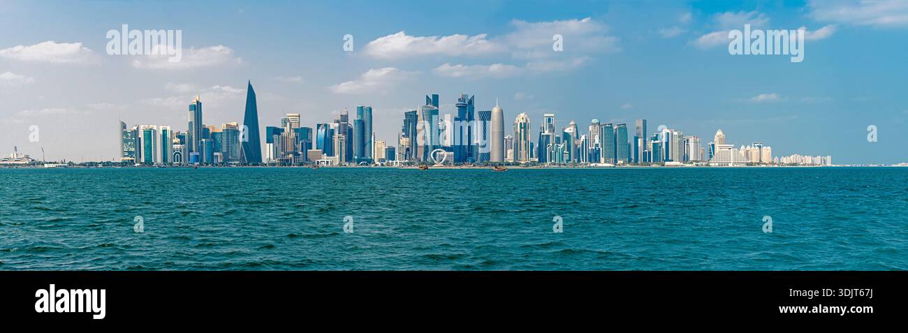 Panorama of the capital of Qatar, the city of Doha from the Persian Gulf. Stock Photo