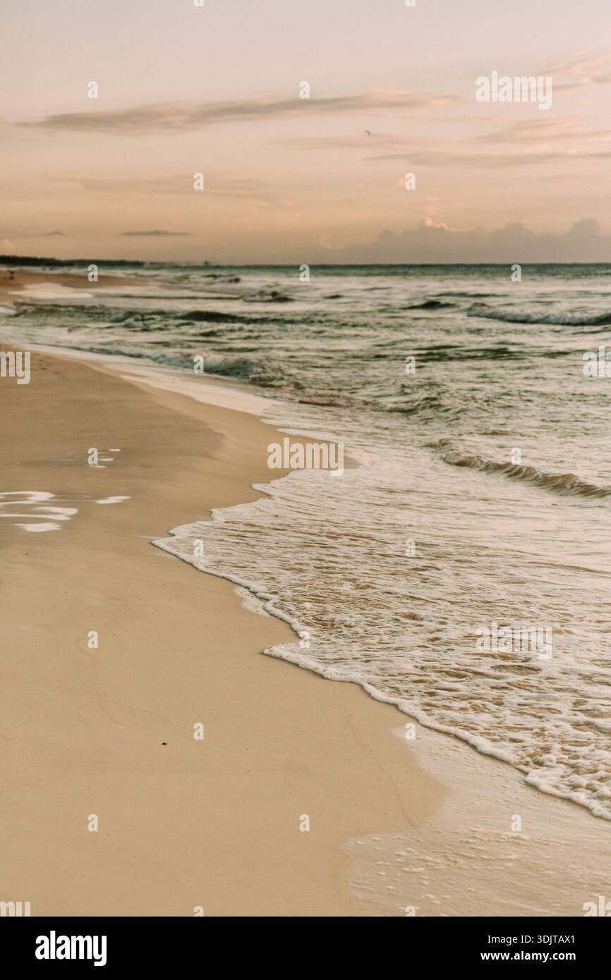 Serene empty beach gentle waves hi-res stock photography and images - Alamy