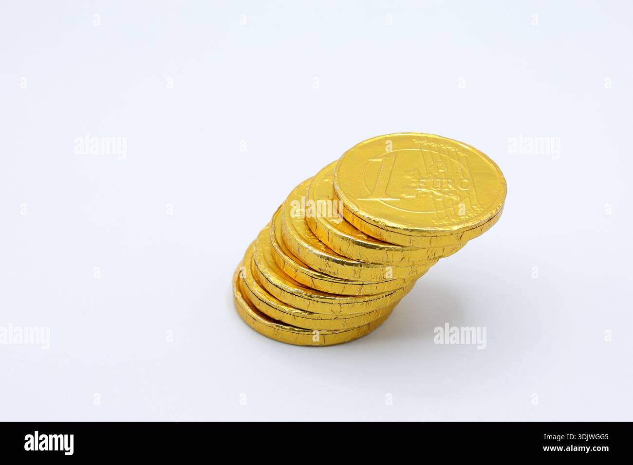 Round gold wrapped chocolate hi-res stock photography and images - Alamy