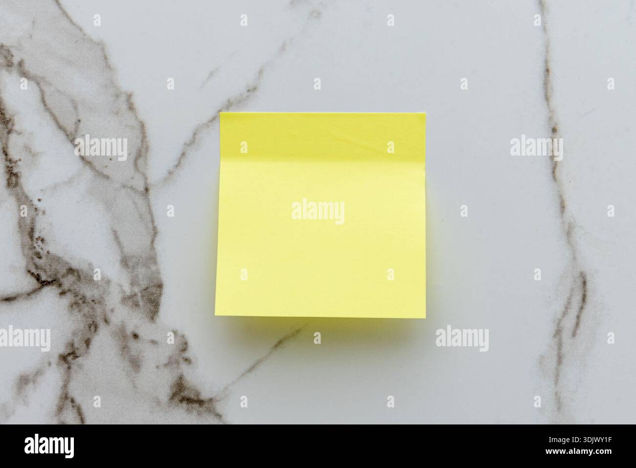 Colored Blank empty Sticky Sticker Pasted On White isolated Wall, Creative copy Space For Text Stock Photo