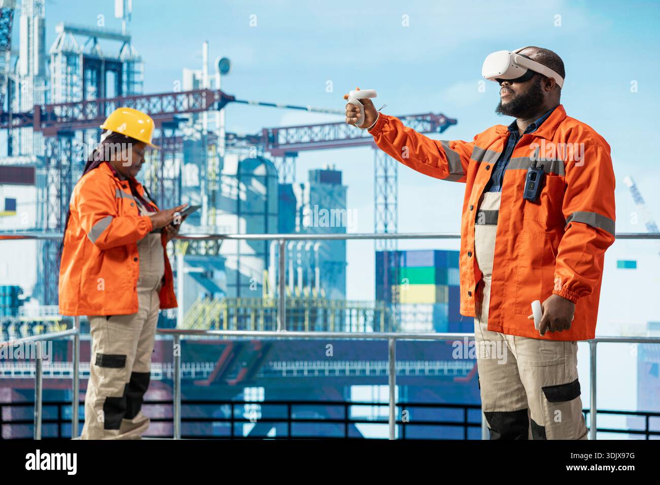 Monitoring Rig Offshore rig technician monitoring operations using VR goggles ...