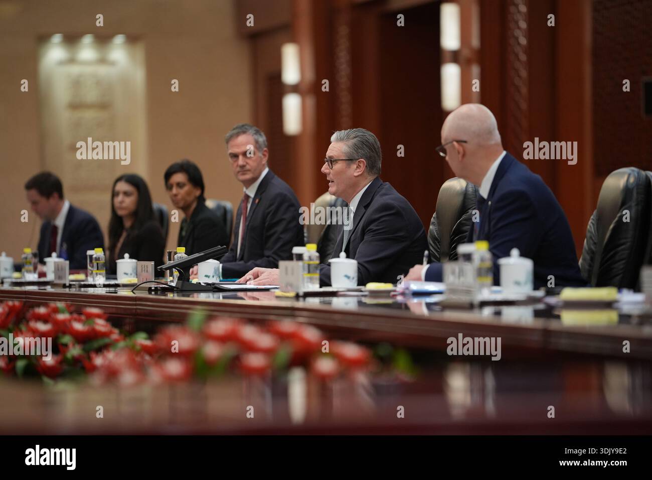 Britain's Prime Minister Keir Starmer, second from right speaks during ...