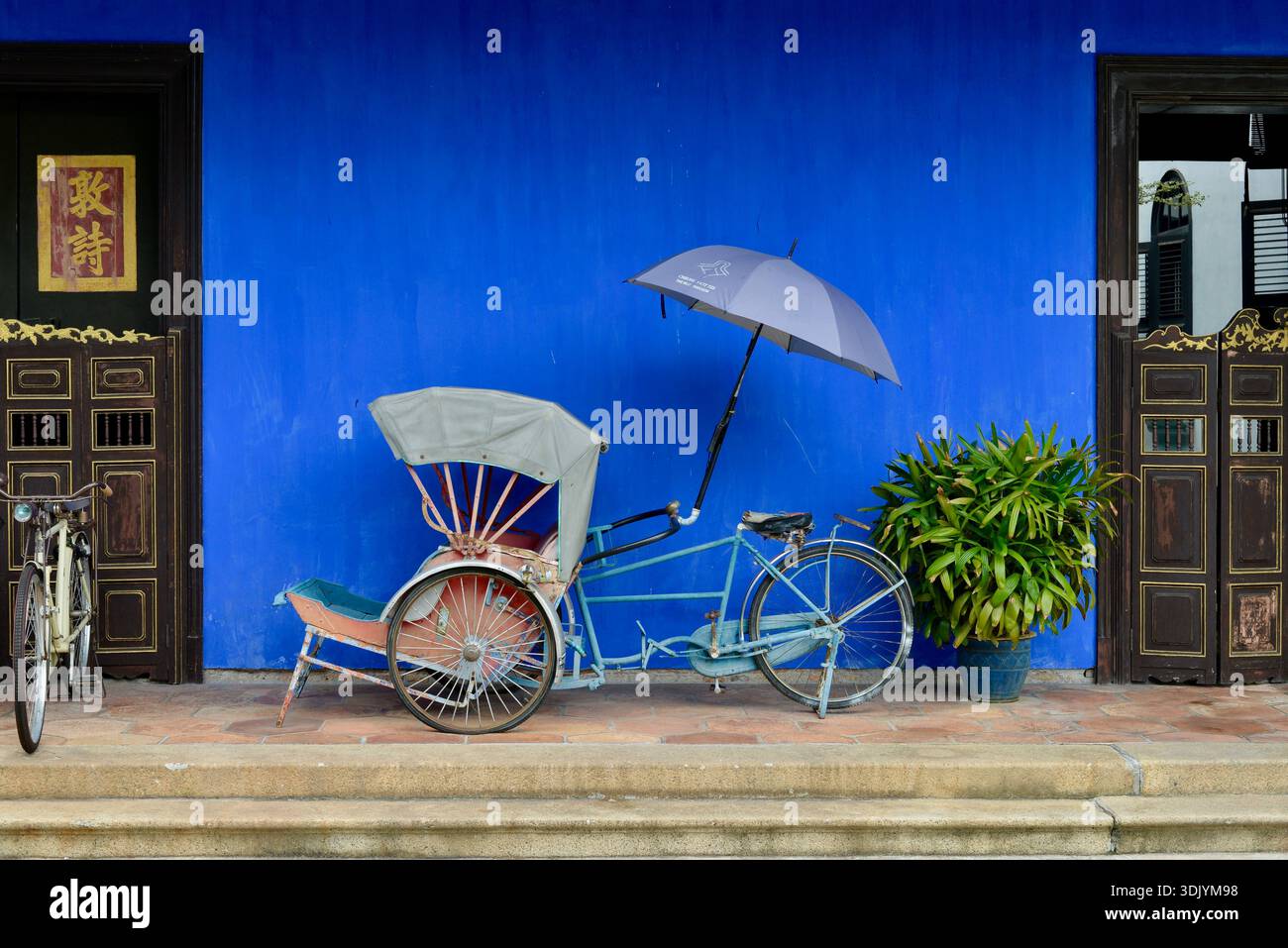 The Iconic Indigo-Blue Facade of the Cheong Fatt Tze Blue Mansion, George Town, Penang, Sept 2024, Malaysia Stock Photo