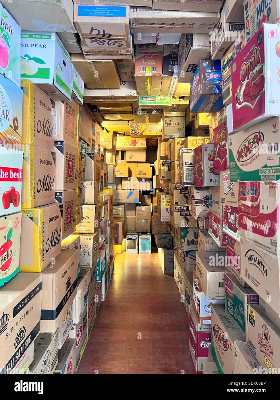 Display of artwork of carton boxes forming standard 20 foot shipping container. - Smartphone Captured Stock Image